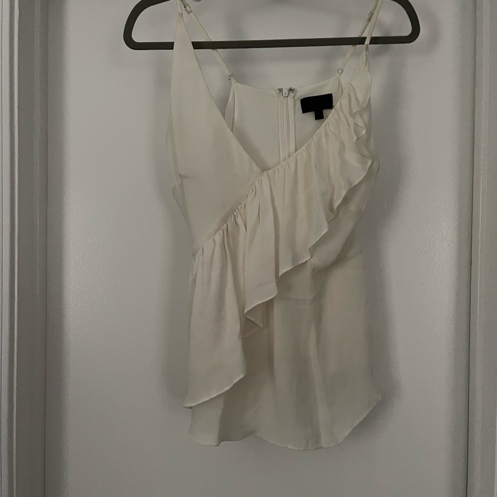One of my favorite Intermix tops. Great for wearing alone or under anything!